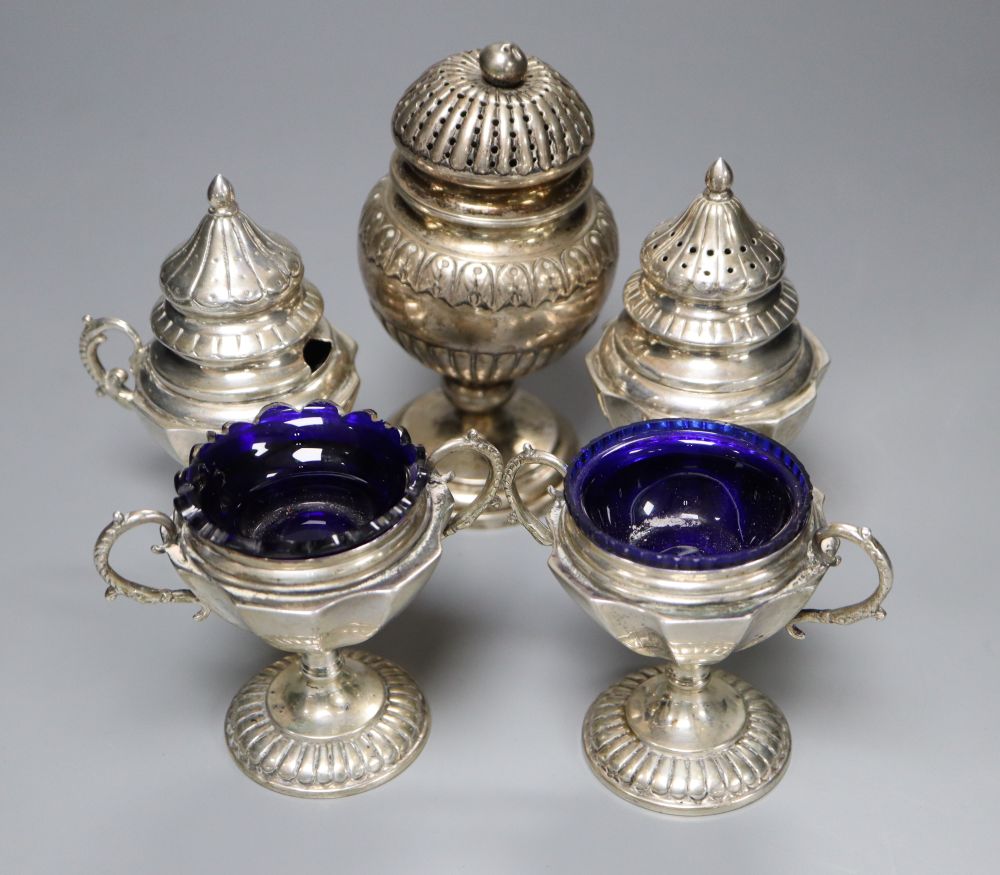 Two pairs of early 20th century Danish white metal condiments and an earlier Danish pedestal caster, tallest 14.4cm, gross 17oz.